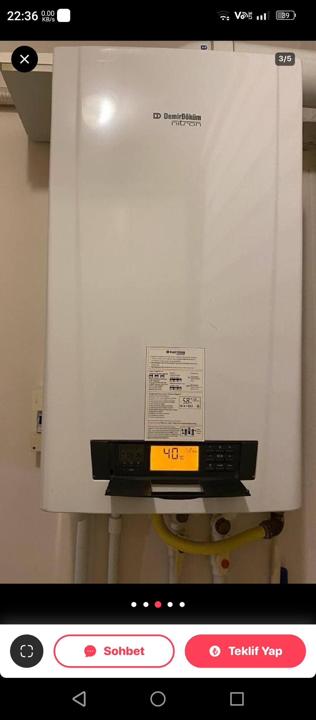 White DemirDöküm Nitron wall-mounted boiler featuring a digital display showing temperature and pressure.